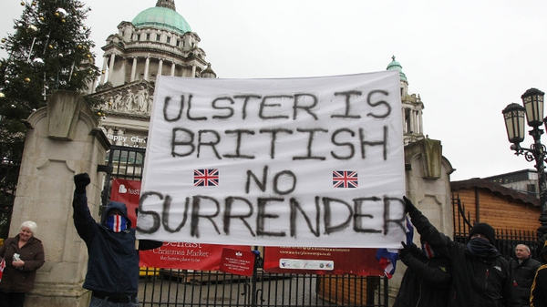 Loyalists opposed to a restriction on the number of days the Union flag can be flown over Belfast City Hall