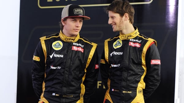 Lotus' Finnish Kimi Raikkonen (l) and Swiss Romain Grosjean will be partners in 2013