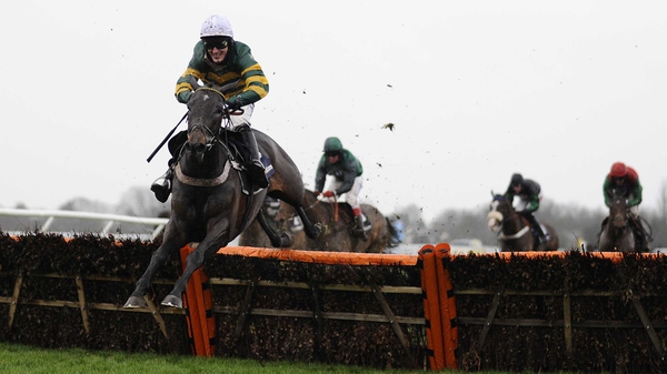 Tony McCoy riding Darlan clear of the last to win the williamhill.com Christmas Hurdle
