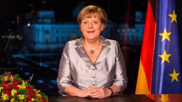 Angela Merkel says reform measures designed to address the roots of the problem are beginning to bear fruit