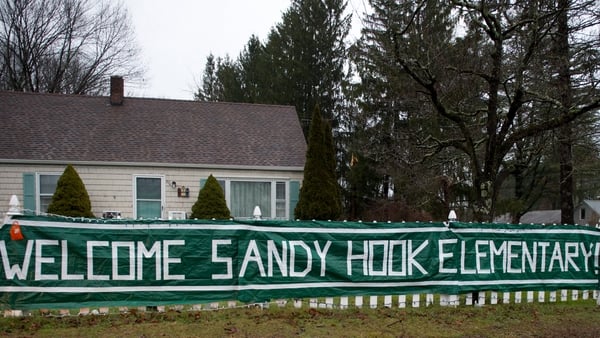 A sign near Chalk Hill school greets students from Sandy Hook