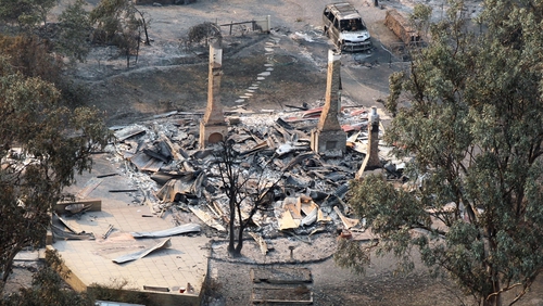 This aerial photograph shows the devastated town of Dunalley after bush fires swept through the area