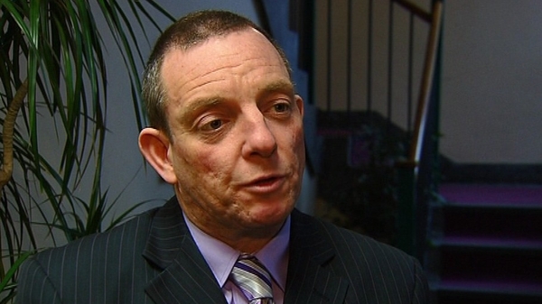 Jerry Buttimer believes the plan could be changed for health organisations that continue to pay executives top-up money on their salaries