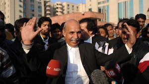 Indian lawyer VK Anand, who represents defendant Ram Singh who is on trial for the gang-rape of a student, gestures as he speaks with the media