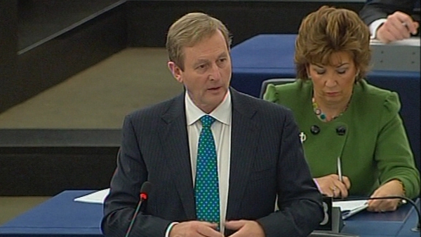 Enda Kenny said the people of Ireland still laboured under the weight of bank-related debt