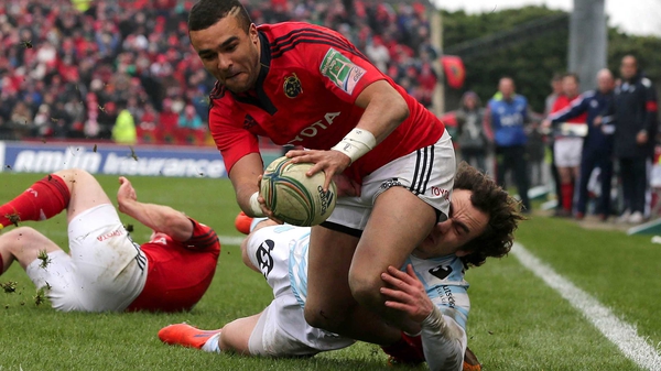 Simon Zebo scored a hat-trick of tries as Munster booked their place in the Heineken Cup quarter-final