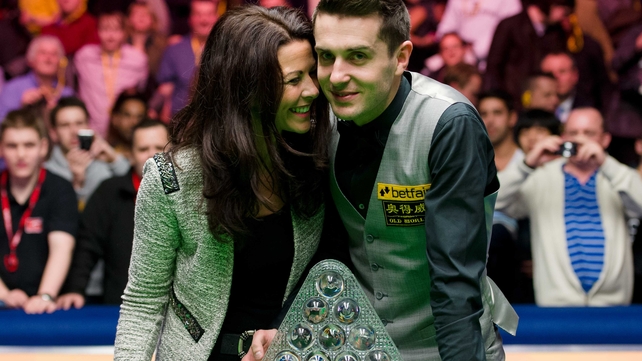 Mark Selby and his wife Vikki with The Masters trophy