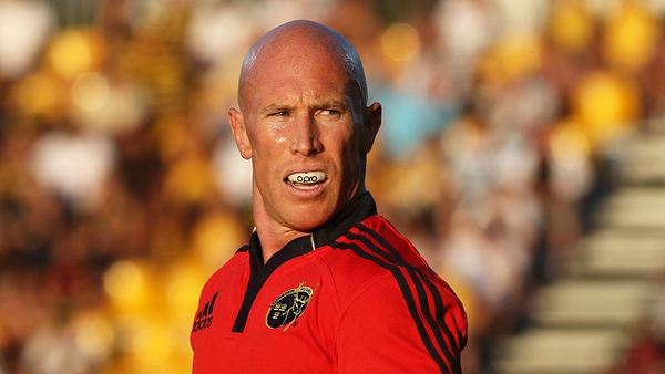 Peter Stringer in the red of Munster
