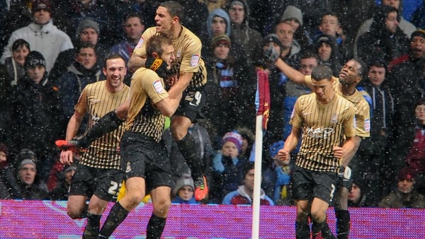 Celebration time for Bradford players at Villa Park where they booked their place in the final