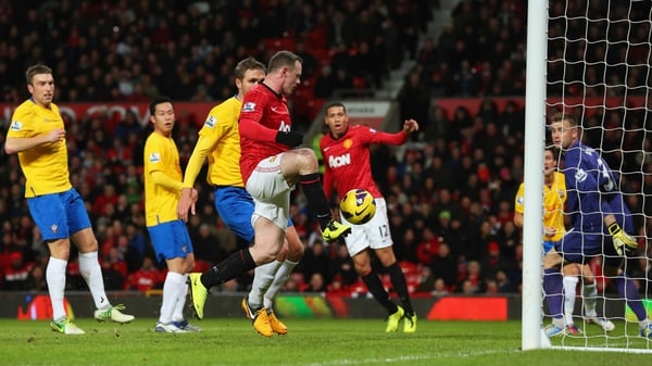 Wayne Rooney taps in United's opener