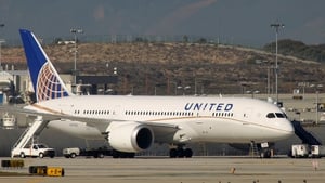 A grounded Boeing 787 Dreamliner jet operated by United Airlines is parked at Los Angeles International Airport