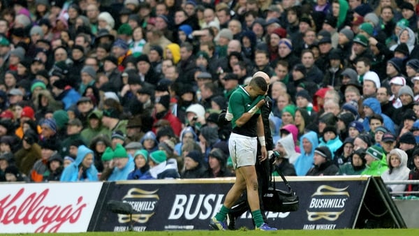 Simon Zebo goes off injured during the defeat to England