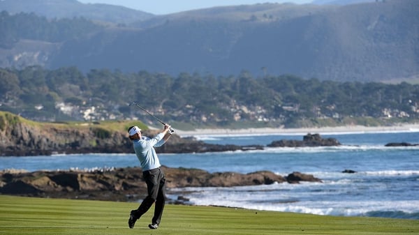 Brandt Snedeker hits his third shot on the 18th hole during the final round of the AT&T Pebble Beach National Pro-Am