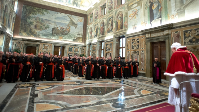 Pope Benedict attends a meeting with his cardinals during a farewell ceremony this morning