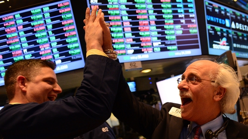 Optimism over international trade talks boost stocks on Wall Street