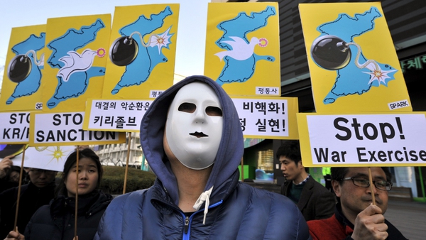 Anti-war activists in Seoul demonstrate against military drills on the Korean Peninsula