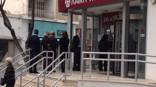 Anxious bank customers queued to withdraw money from one of the few operating ATMs in Cyprus (Pic: Will Goodbody)