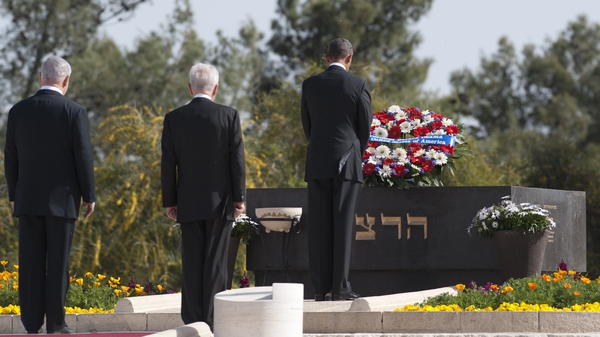 Barack Obama lays a wreath at the grave of Theodor Herzl at Mount Herzl