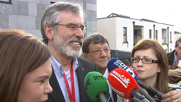 Party leader Gerry Adams speaks to reporters in Castlebar this evening