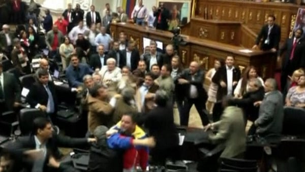 The fracas came after the Assembly passed a measure denying opposition members the right to speak until they publicly recognised President Nicolas Maduro