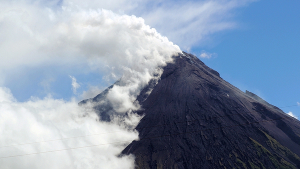 A sudden explosion of rocks, ash and plumes of smoke shook the mountain