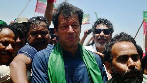 Imran Khan gets last minute surge in support with former prime minister Sharif set to win the most seats