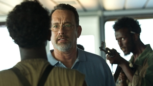 Hanks and Barkhad Abdi (left) in a scene from Captain Phillips