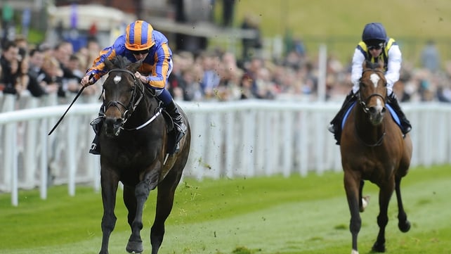 Magician (left) under Ryan Moore was an impressive winner of the Dee Stakes at Chester