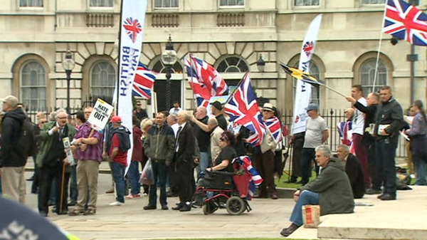 Around 100 people were gathered on Old Palace Yard waving BNP banners