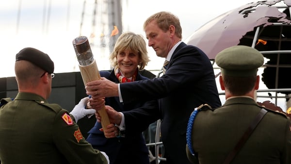 The eternal flame from JFK's grave is delivered by Jean Kennedy Smith and Taoiseach Enda Kenny