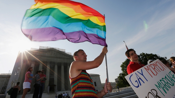 Gay rights activists gathered in front of the US Supreme Court building in Washington