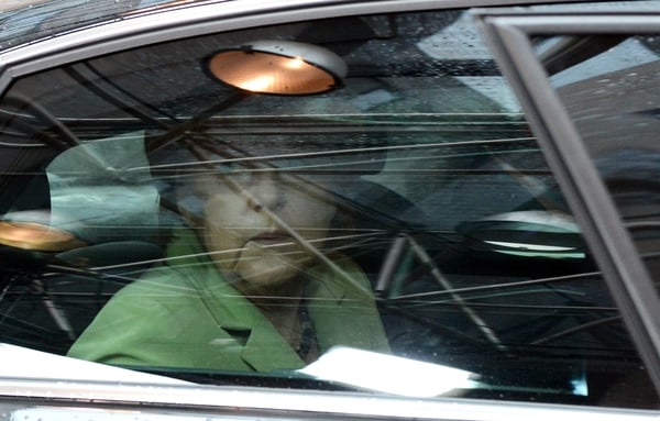 Angela Merkel arriving for EU summit where Germany succeeded in avoiding a vote on strict new car emissions levels
