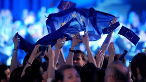 Croatians wave EU flags as they celebrate the accession of Croatia to the European Union