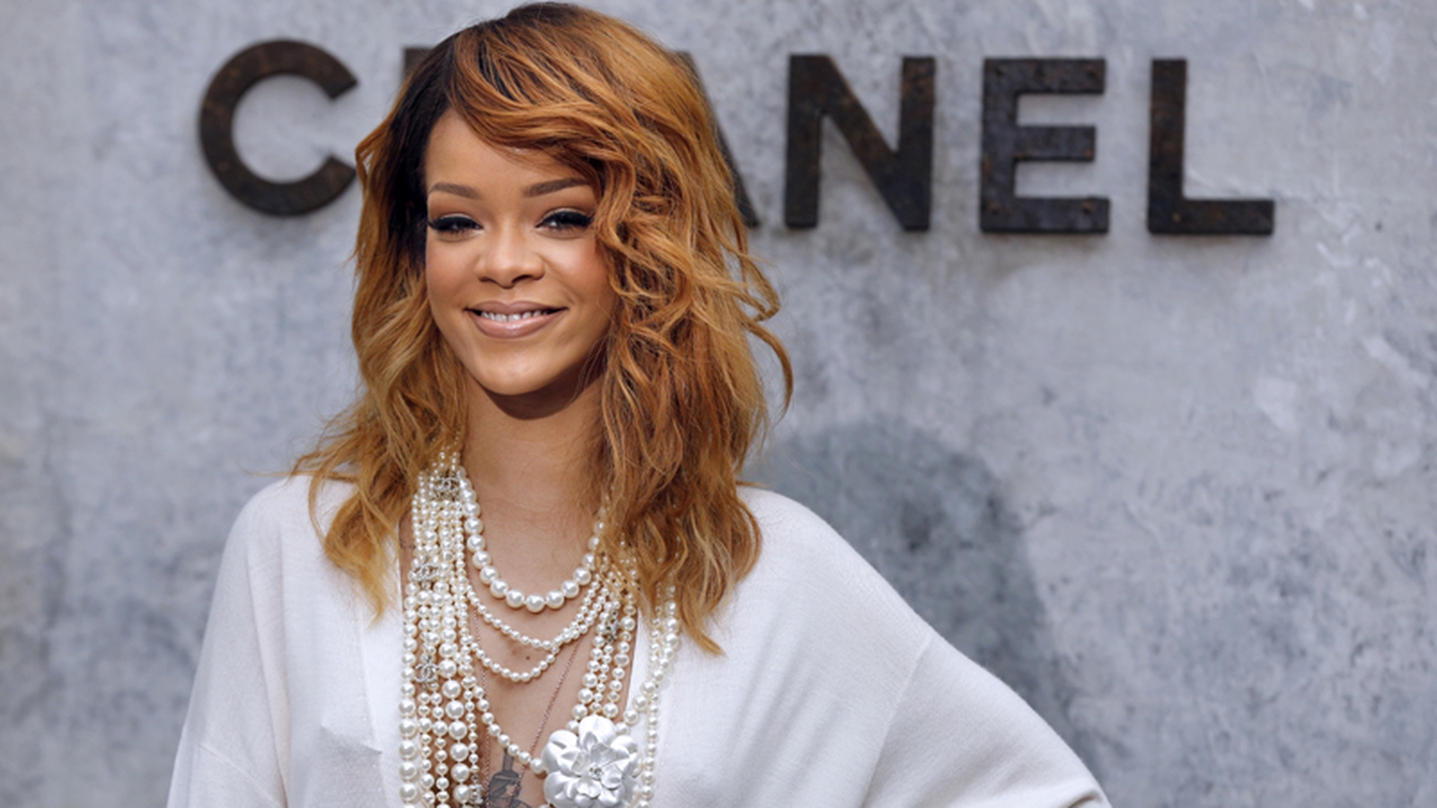 Rihanna wears revealing cardie to Chanel