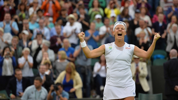 Kirsten Flipkins celebrates reaching the last four at Wimbledon