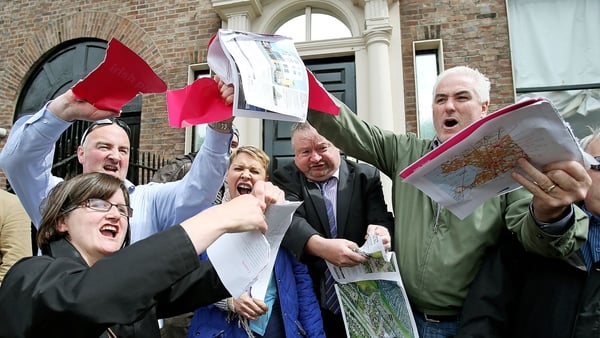 Protesters outside the Shelbourne Hotel ripped up copies of Allsops Irish property brochure