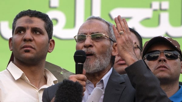 Mohamed Badie (C) had been in hiding since the crackdown against pro-Mursi supporters