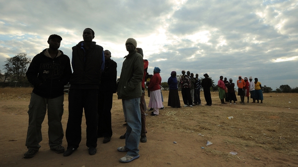 Voters queue in last week's Zimbabwean presidential election