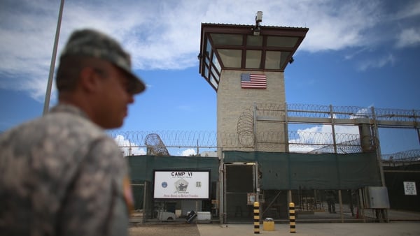 An officer stands outside Camp VI of the US military detention facility at Guantanamo Bay