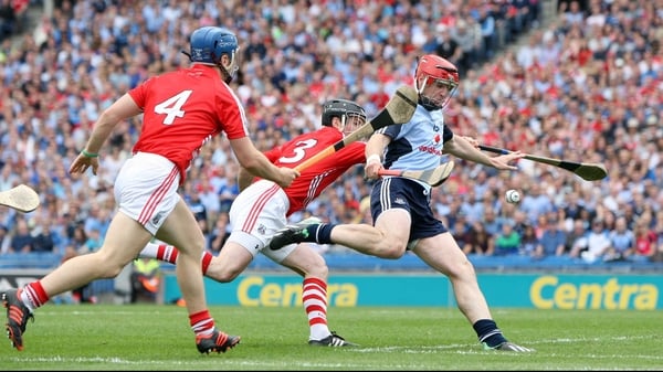 Cork secured a five-point victory over 14-man Dublin