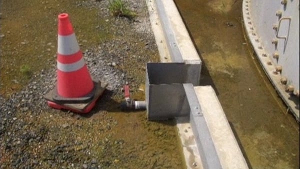 Contaminated water gathering beside a valve which is believed to have caused the leak