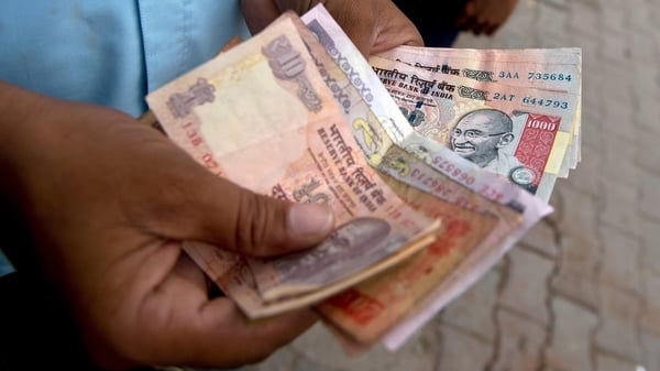The rupee rose as high as 66.85 per dollar after the open, up from a record low of 68.85 yesterday
