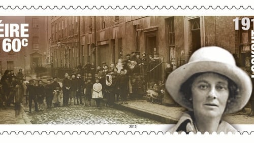 Stamp depicting Countess Markievicz outside tenement buildings