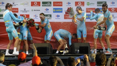 Astana Pro Team celebrates on the podium their victory