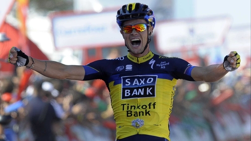 Nicolas Roche celebrates at the line