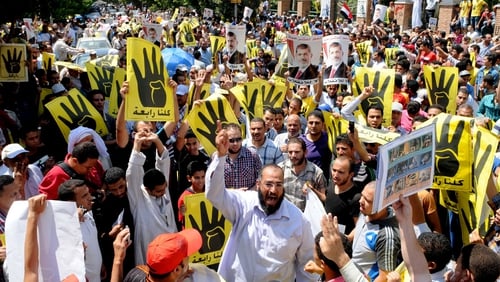 Muslim Brotherhood supporters take part in a demonstration in Hilwan, south of Cairo,