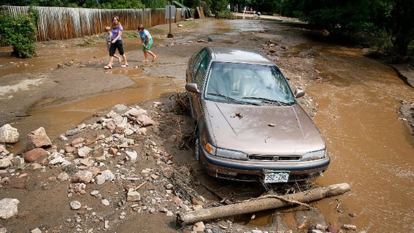 The floods were triggered by unusually heavy late-summer storms that drenched Colorado's biggest urban centres