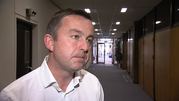 Brian Hayes said the Government should surpass the deficit reduction target
