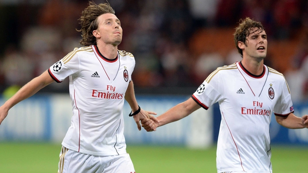 Riccardo Montolivo (l) and Andrea Poli are likely to miss Milan's tie with Celtic
