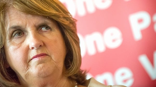Joan Burton has expressed concern over the impact of savings required from her department